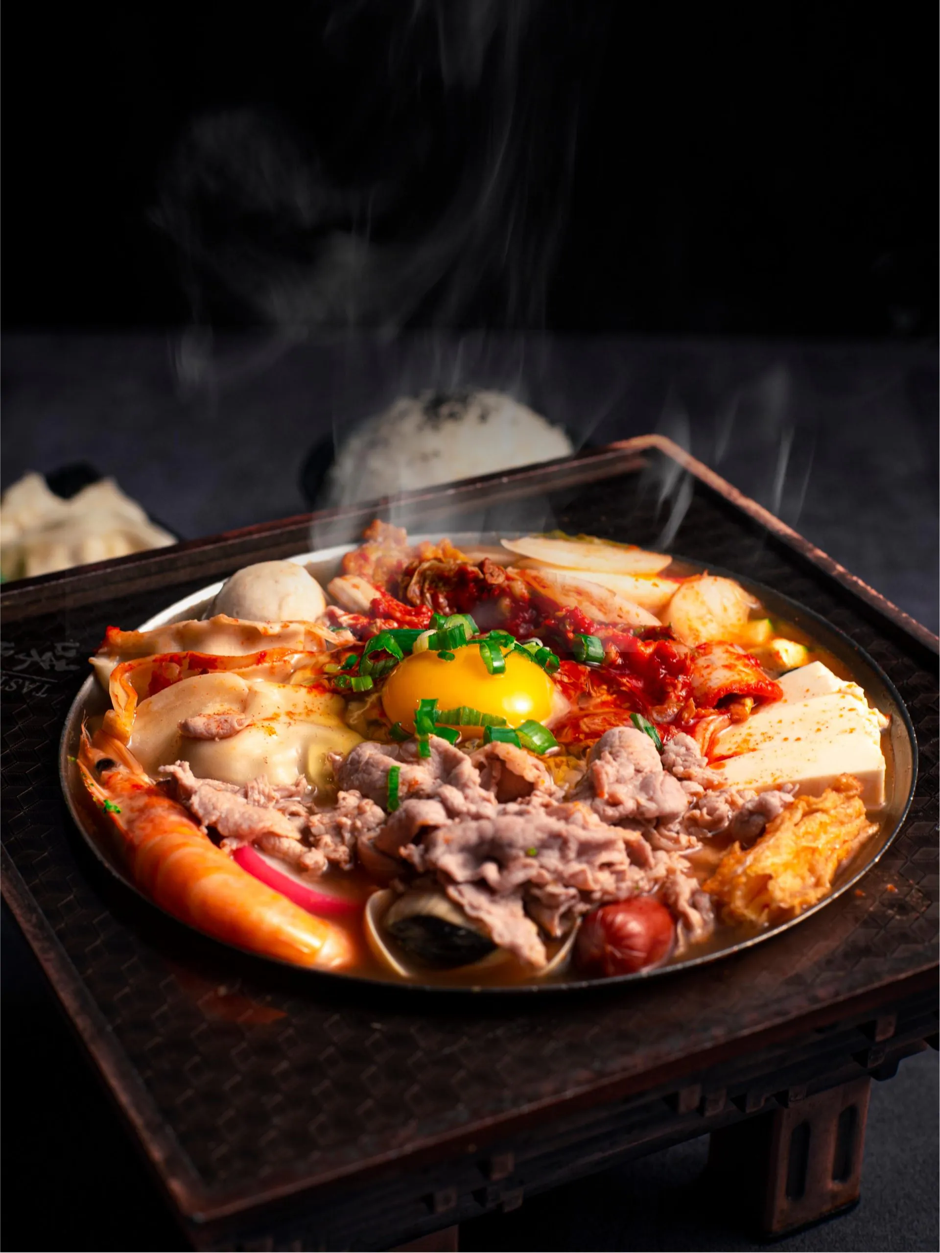 Spicy kimchi hot pot with seafood, beef and dumplings at Tasty Pot, a Taiwanese Restaurant in Redding